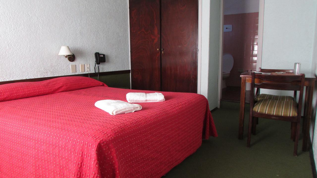 Hotel Cabo Santa Maria La Paloma Quarto foto